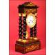 Beautiful French Portico Clock with Marquetry and Gilded Bronze. 1870.