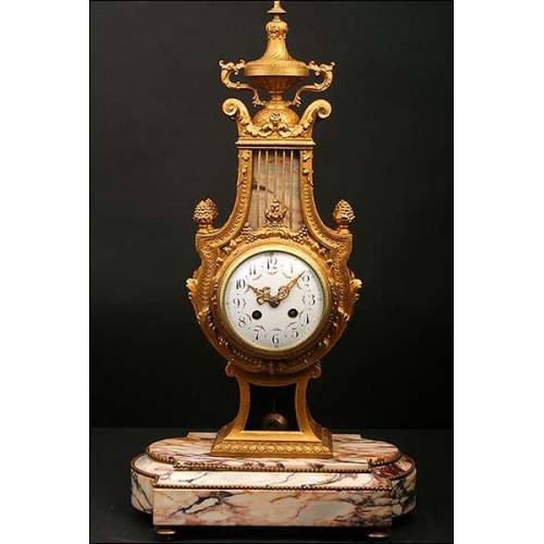 French clock with pendulum in the form of a lyre. 1870