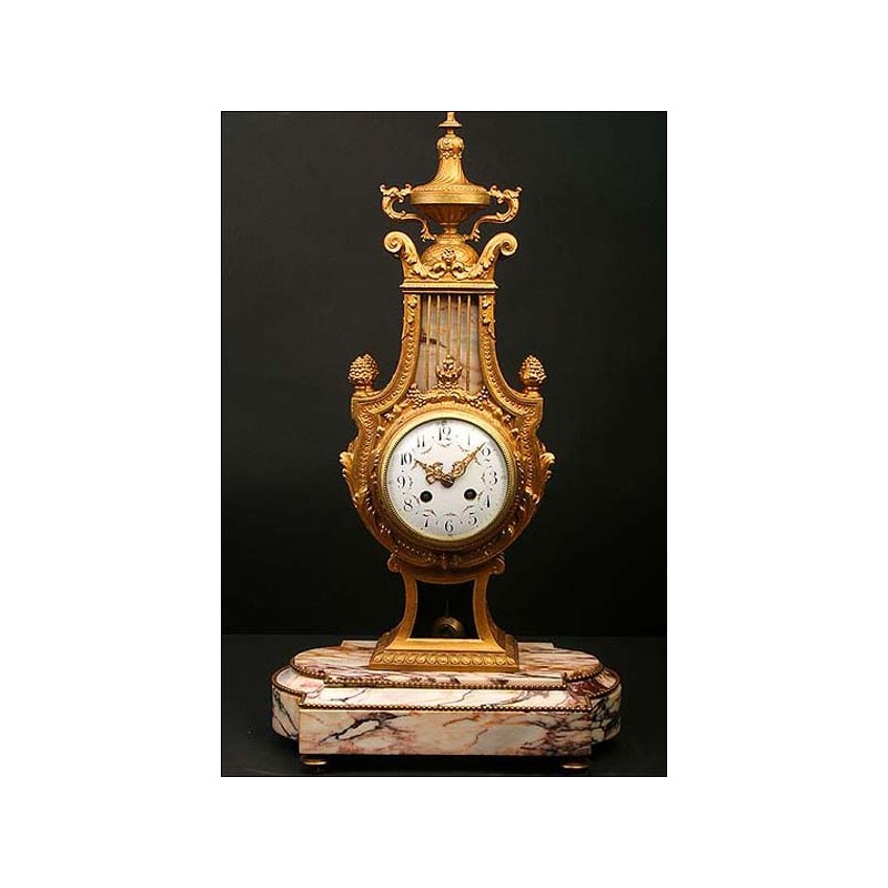 French clock with pendulum in the form of a lyre. 1870