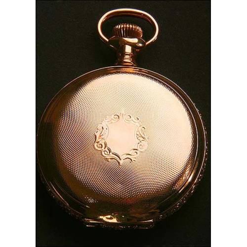 Magnífico reloj de bolsillo en oro macizo. Firmado. Tres tapas. 1884