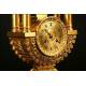 Reloj antiguo en bronce dorado y forma de Lira. S. XIX