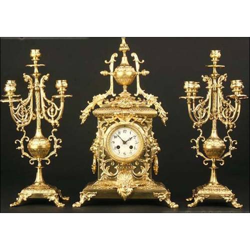 Bronze mantel clock and garnish. 1880