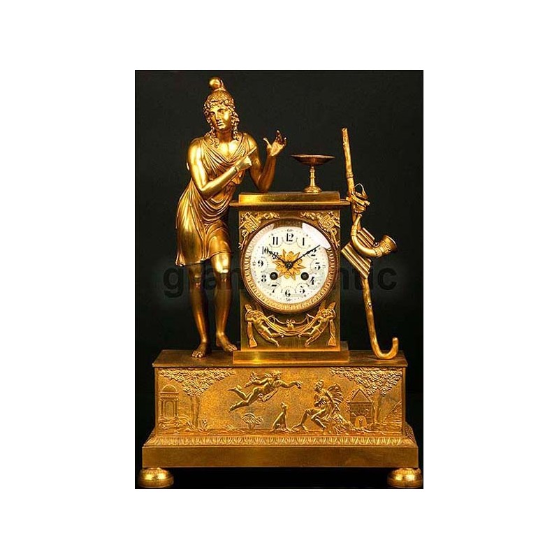 Antiguo reloj francés en bronce dorado. 1850. Alegoría a la música