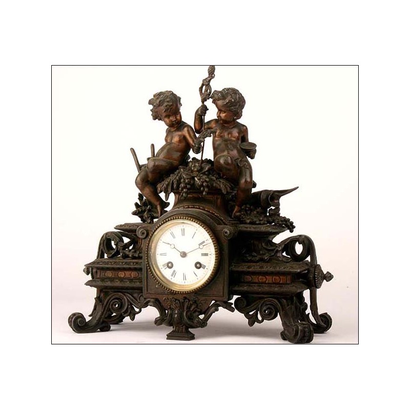 Reloj de péndulo en calamina. 1880