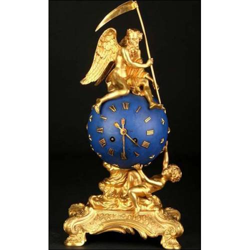 Rarísimo reloj en bronce dorado. El Ángel del Tiempo. 1850-1890.