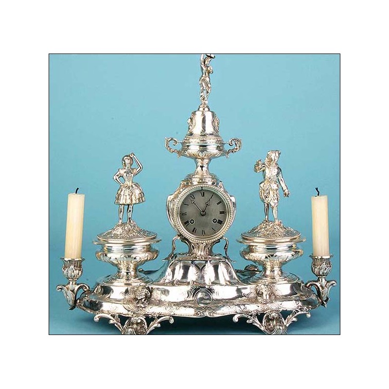 Antique solid silver scribe clock. 1840-1879. Hugo