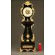 Curious Rococo Mantel Clock in Ebonized Wood and Brass Sconces, ca.1900.