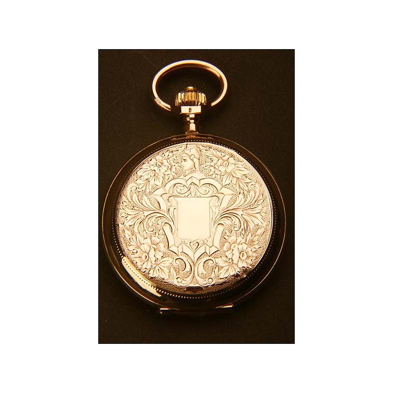 Reloj de bolsillo en oro macizo. Tres tapas. 15 rubíes. 1900