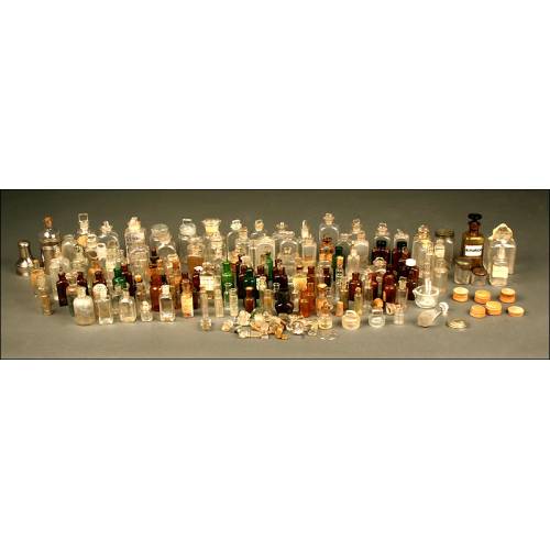 Large Collection of Glass Apothecary Bottles and Labels. 1st Half s. XX.