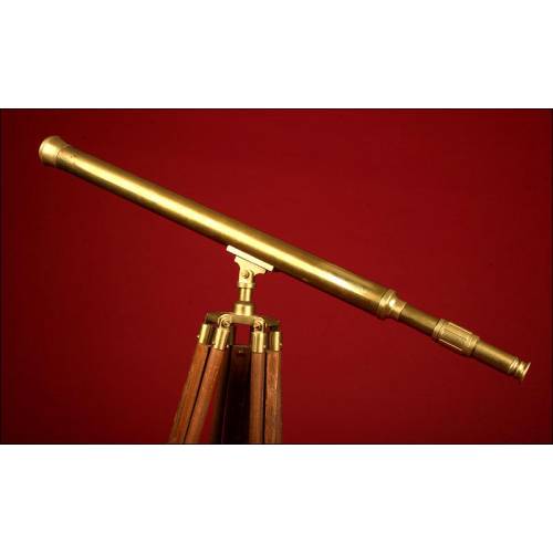 Brass Telescope on Wooden Tripod. 1920's. Good condition.