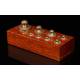 Fine Set of Precision Balance Weights on Mahogany Base. Spain, 1930's