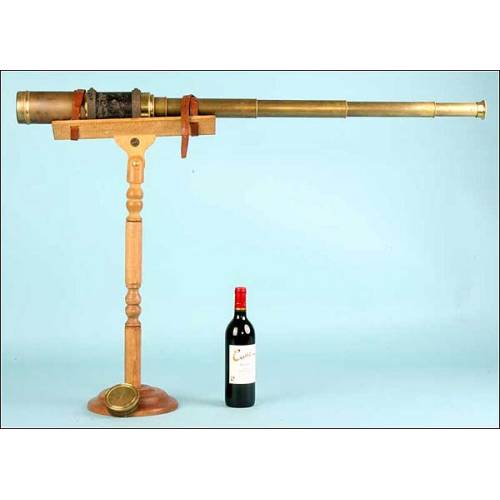 Large spotting scope with wooden stand. 140 cms long