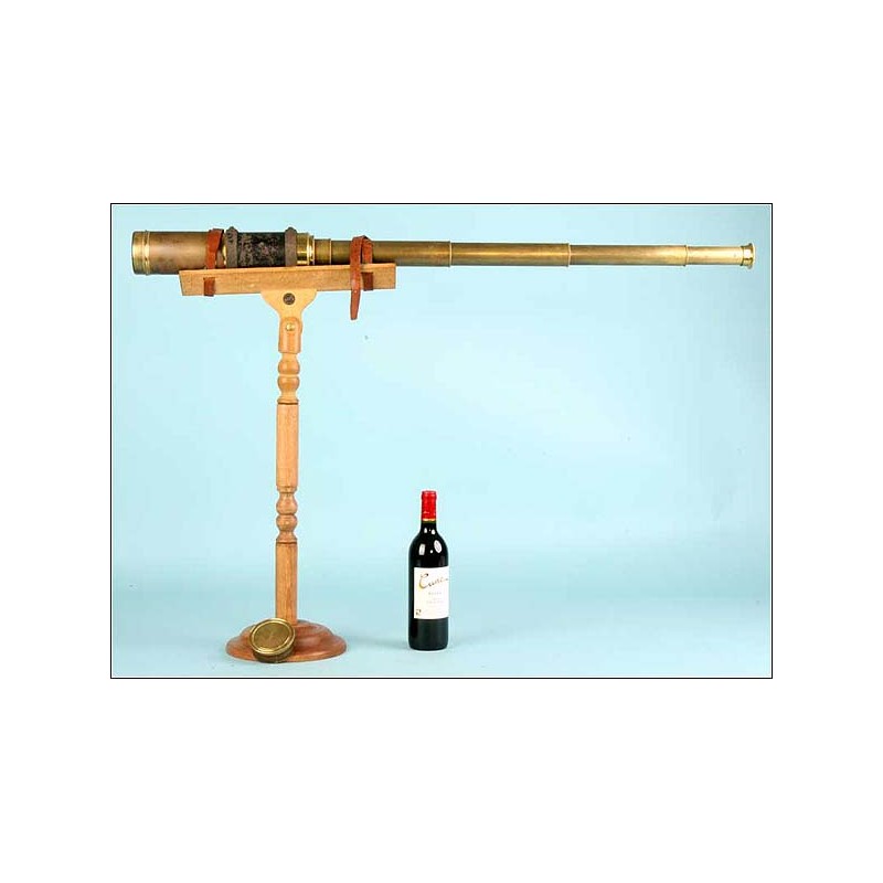 Large spotting scope with wooden stand. 140 cms long