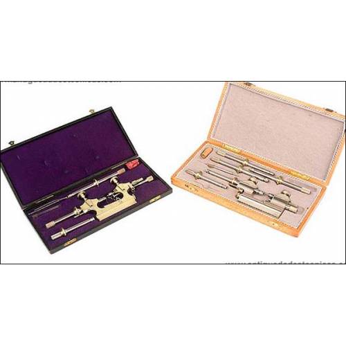 Pair of cases with precision instruments for watchmakers.