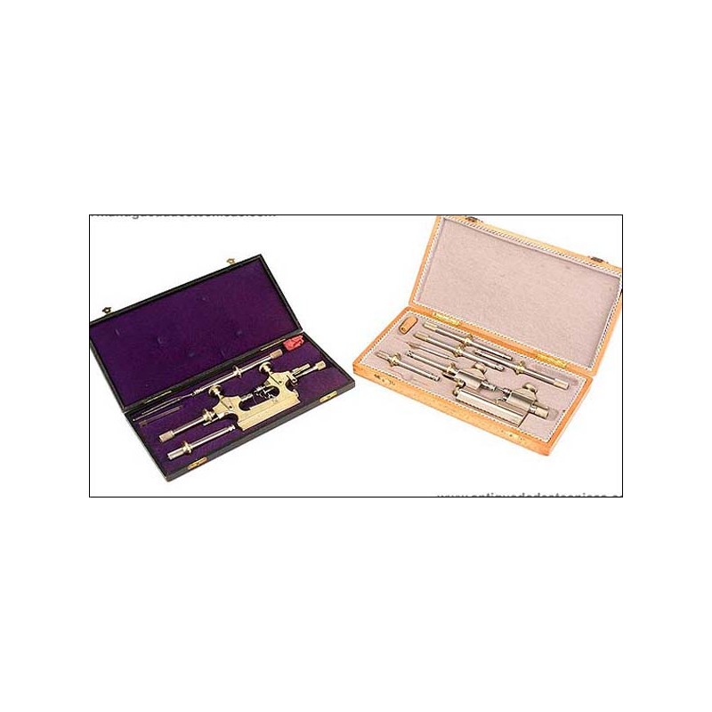 Pair of cases with precision instruments for watchmakers.