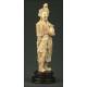 Chinese Figure on Wooden Stand, Circa 1900. Ivory Paste and Hand Decorated.