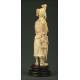 Chinese Figure on Wooden Stand, Circa 1900. Ivory Paste and Hand Decorated.