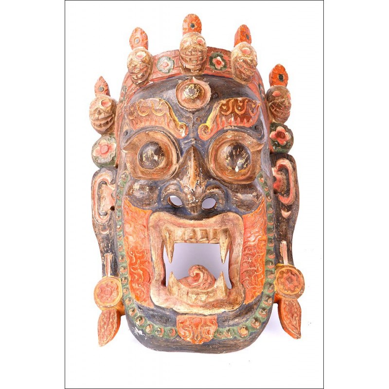 Attractive Carved and Polychrome Mask. Southeast Asia, circa 1900