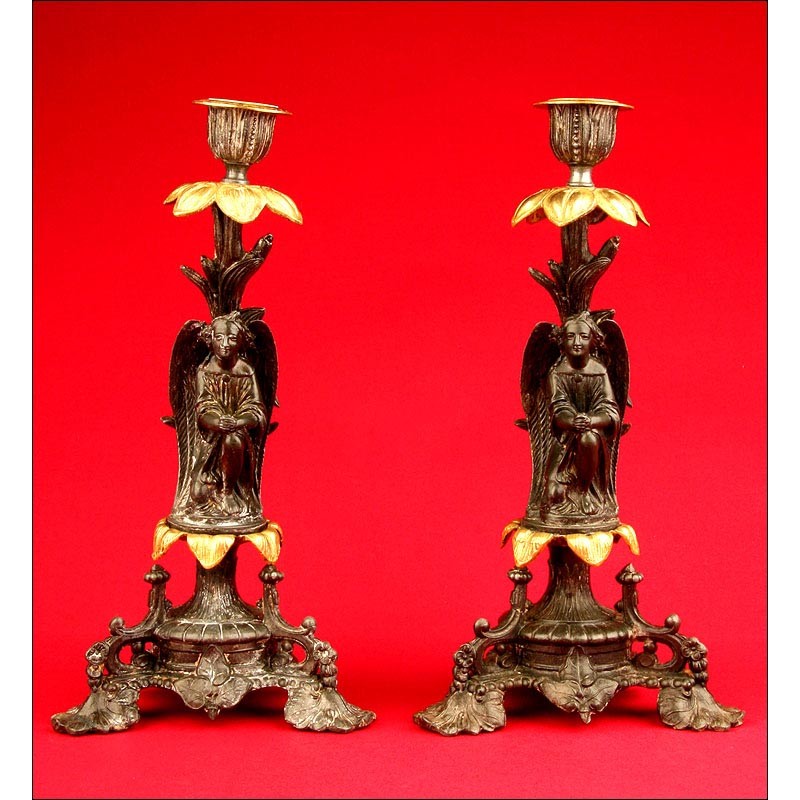 Pair of Decorative Patinated Calamine and Bronze Candlesticks. 1880-1900.