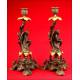 Pair of Decorative Patinated Calamine and Bronze Candlesticks. 1880-1900.