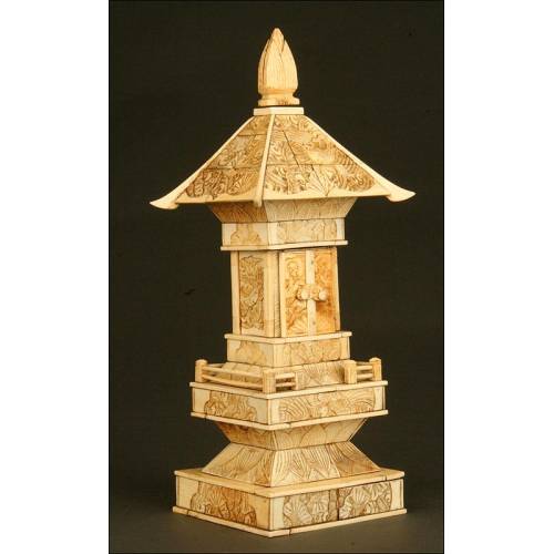 Chinese Carved Ivory Pagoda. XIX Century. Contains a Buddha behind the Upper Doors.